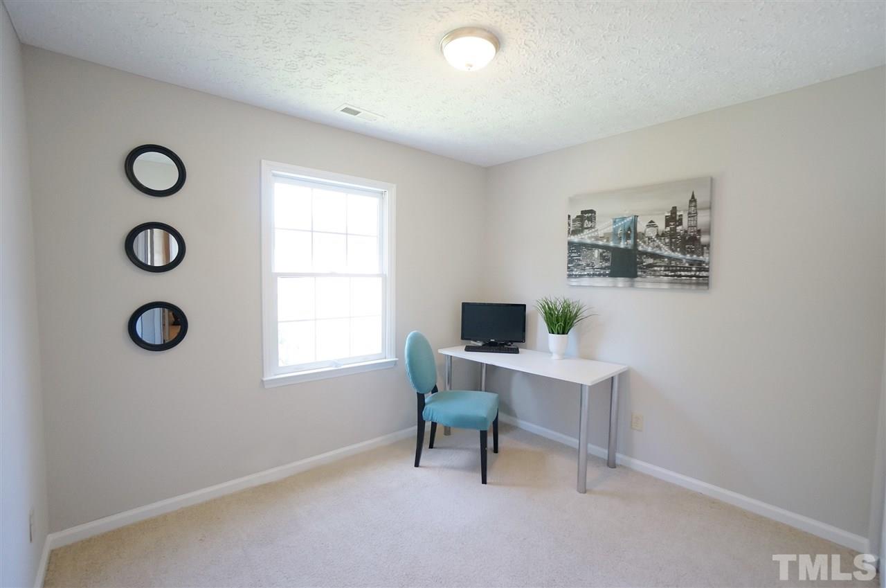 5401 Spring Pines Way Raleigh, NC 27616 - Photo 7 of 16 a view of a workspace with a window