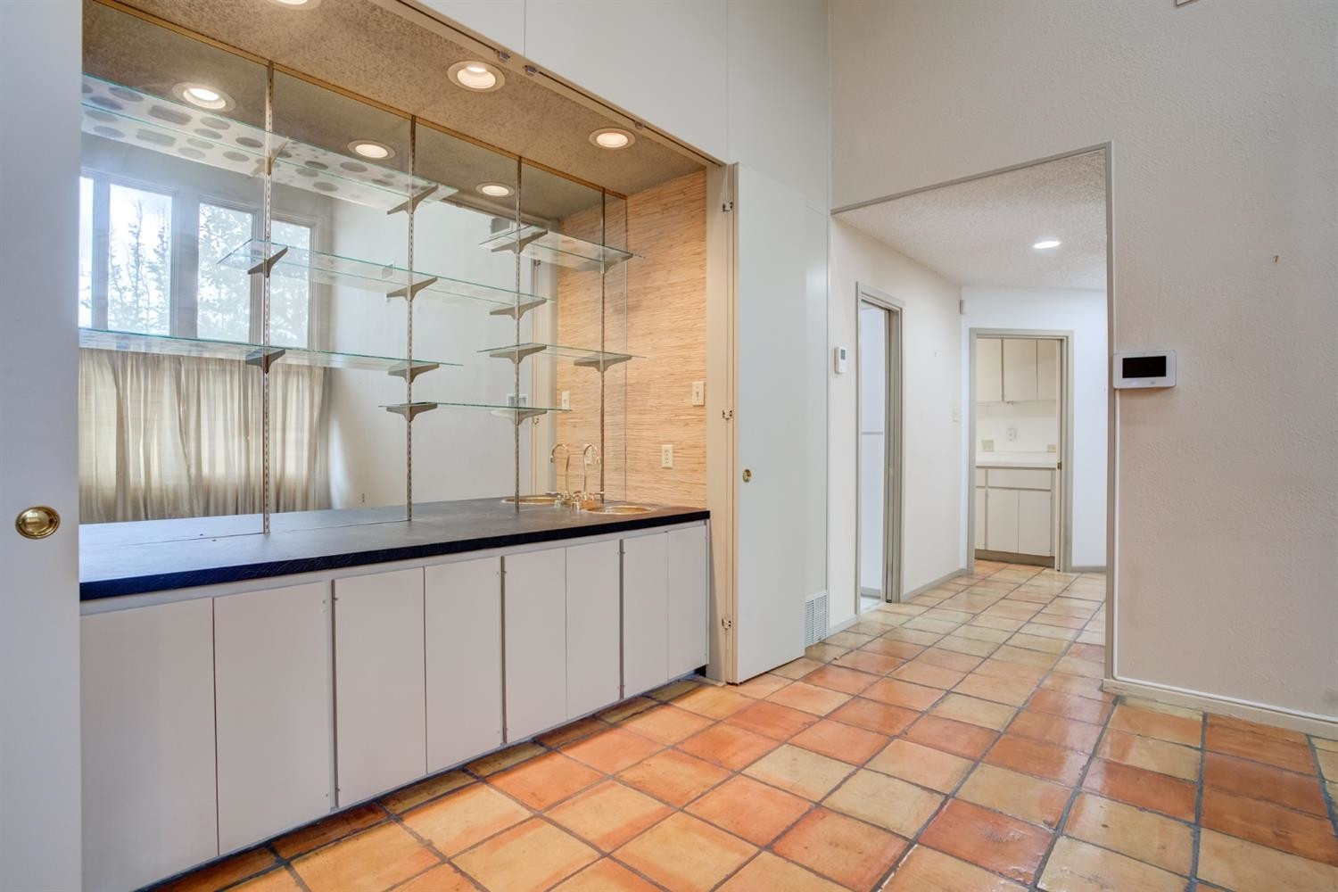 4902 92nd Street Lubbock, TX 79424 - Photo 14 of 44 a view of a hallway with wooden floor and staircase