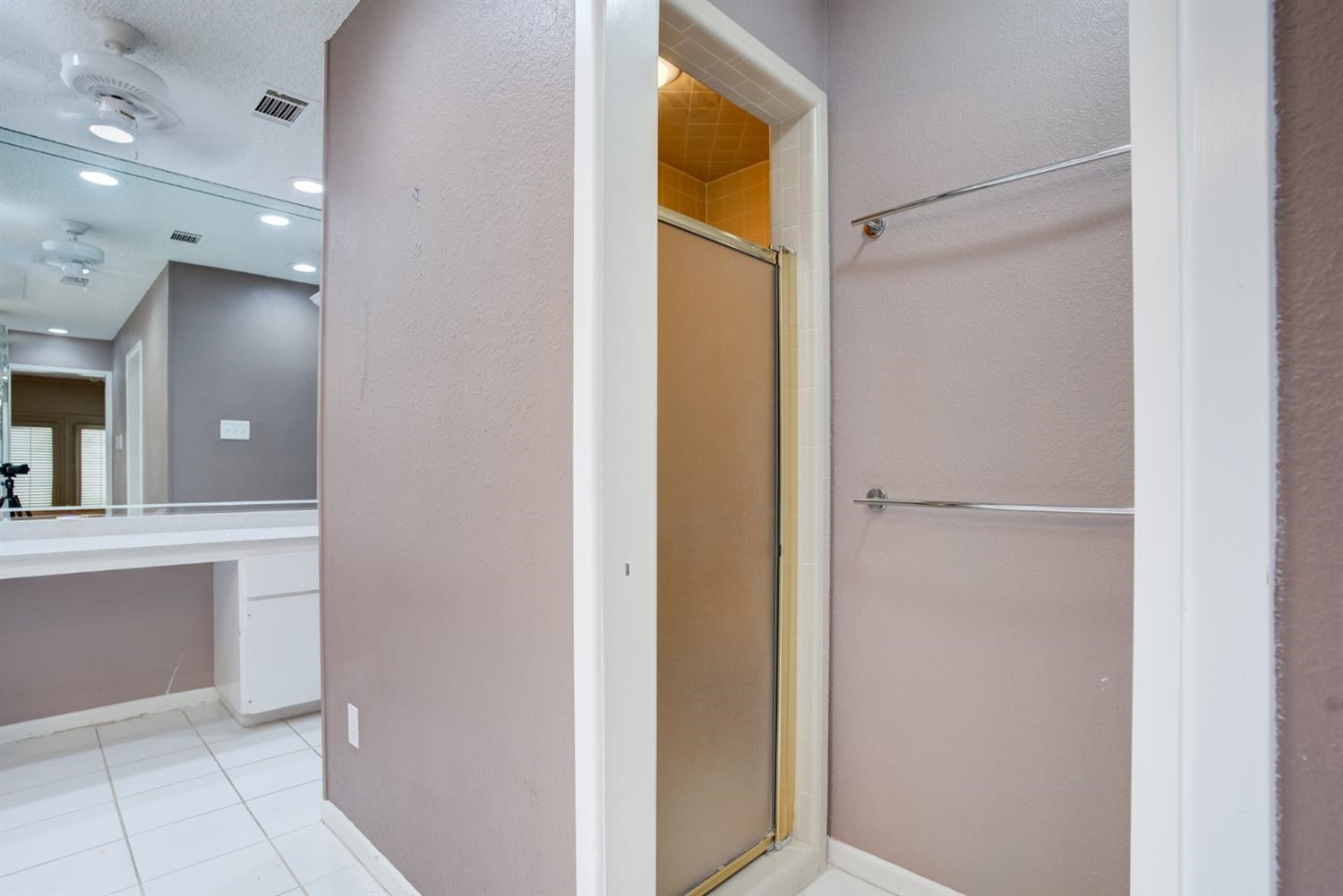 4902 92nd Street Lubbock, TX 79424 - Photo 32 of 44 a view of bathroom with a shower and a sink