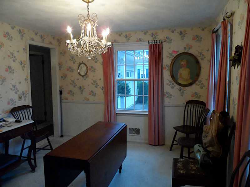 141 Timberline Road Warwick, RI 02886 - Photo 6 of 9 Dining Room. Hardwood floors in the dining room