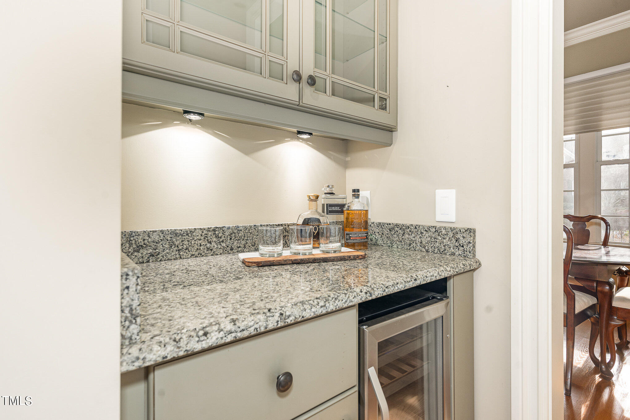 3028 Wyntree Ridge Way Raleigh, NC 27606 - Photo 21 of 39 a bathroom with a granite countertop sink and a mirror