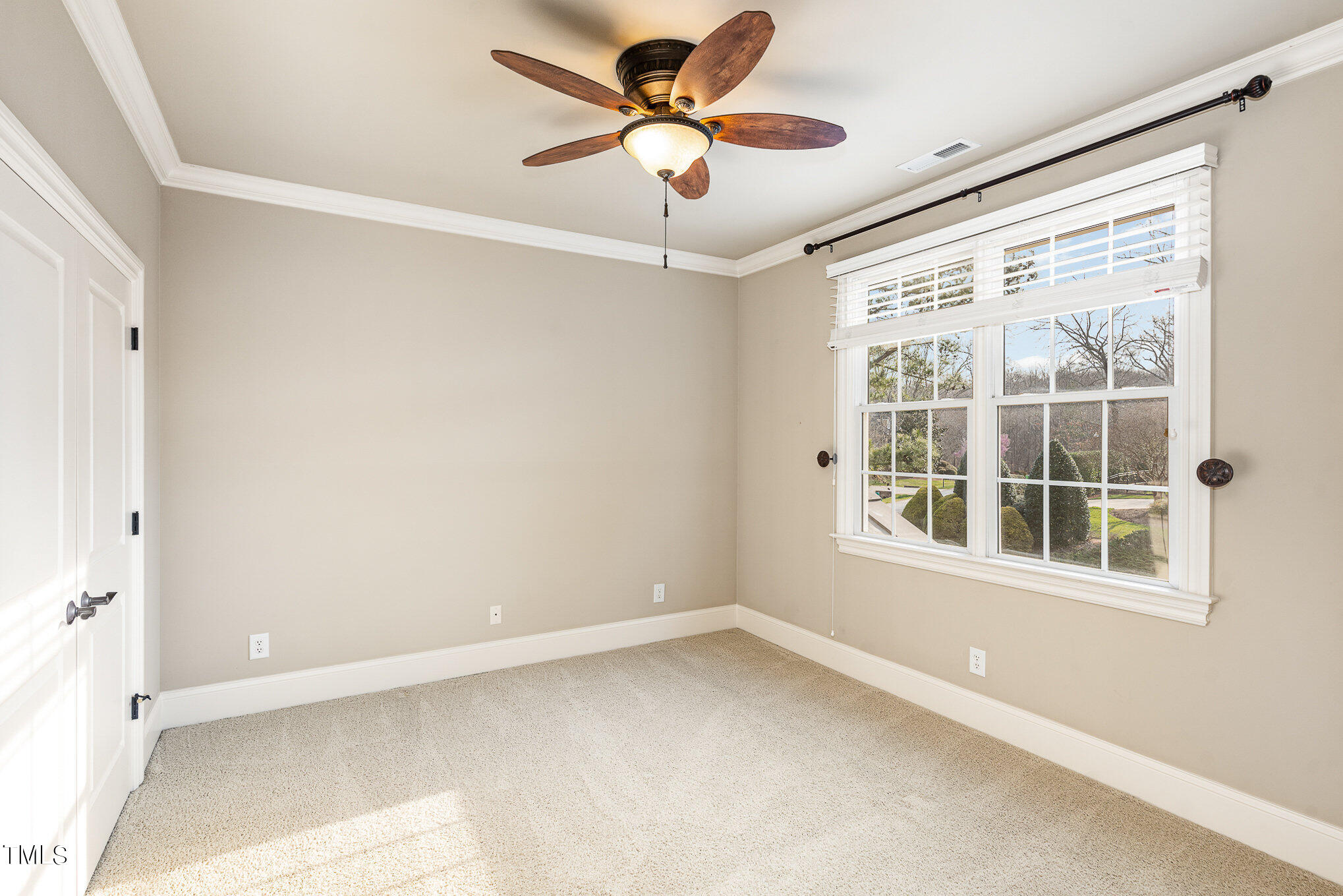 3028 Wyntree Ridge Way Raleigh, NC 27606 - Photo 22 of 39 a view of an empty room with a window