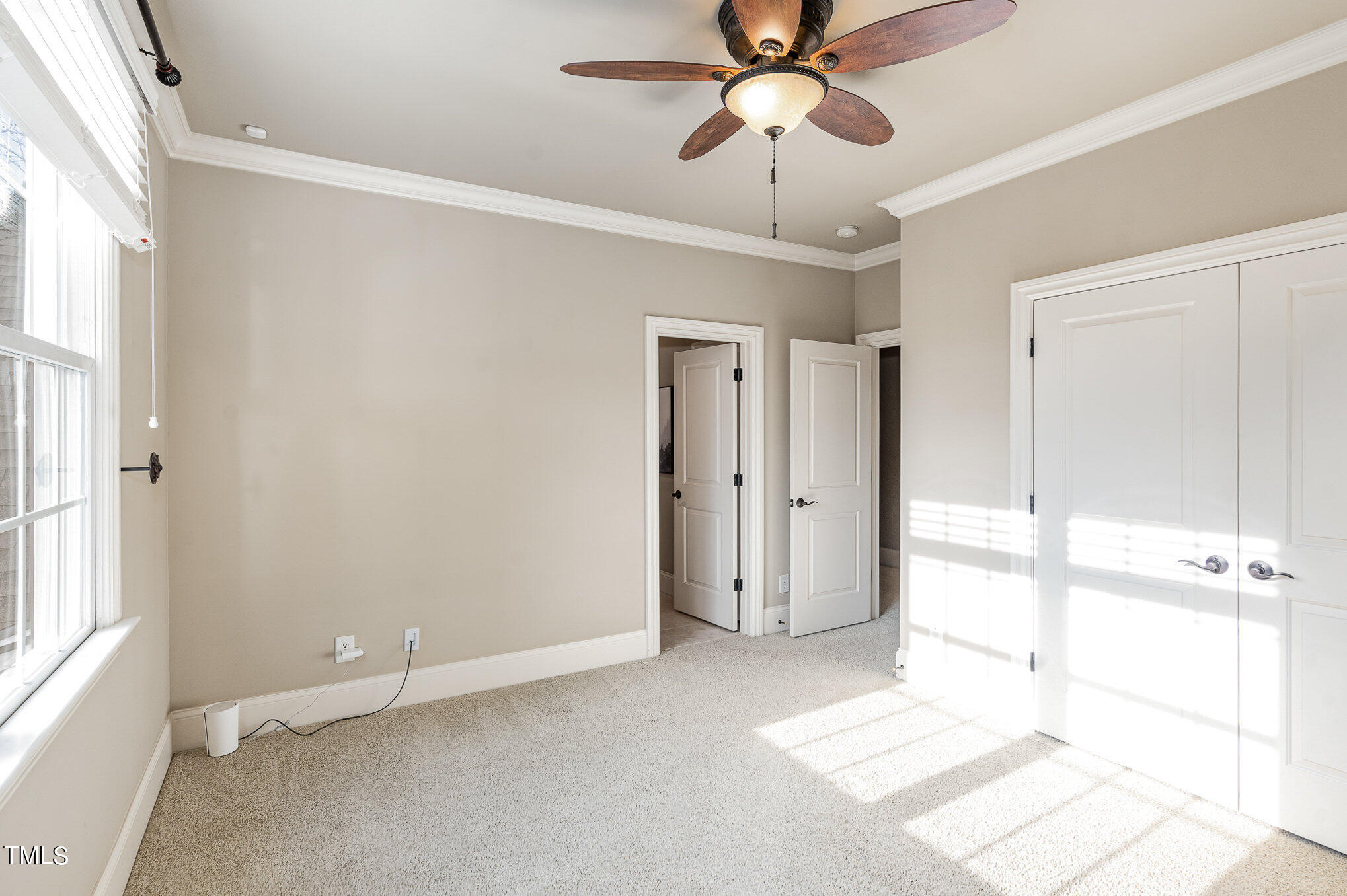 3028 Wyntree Ridge Way Raleigh, NC 27606 - Photo 23 of 39 a view of an empty room and window