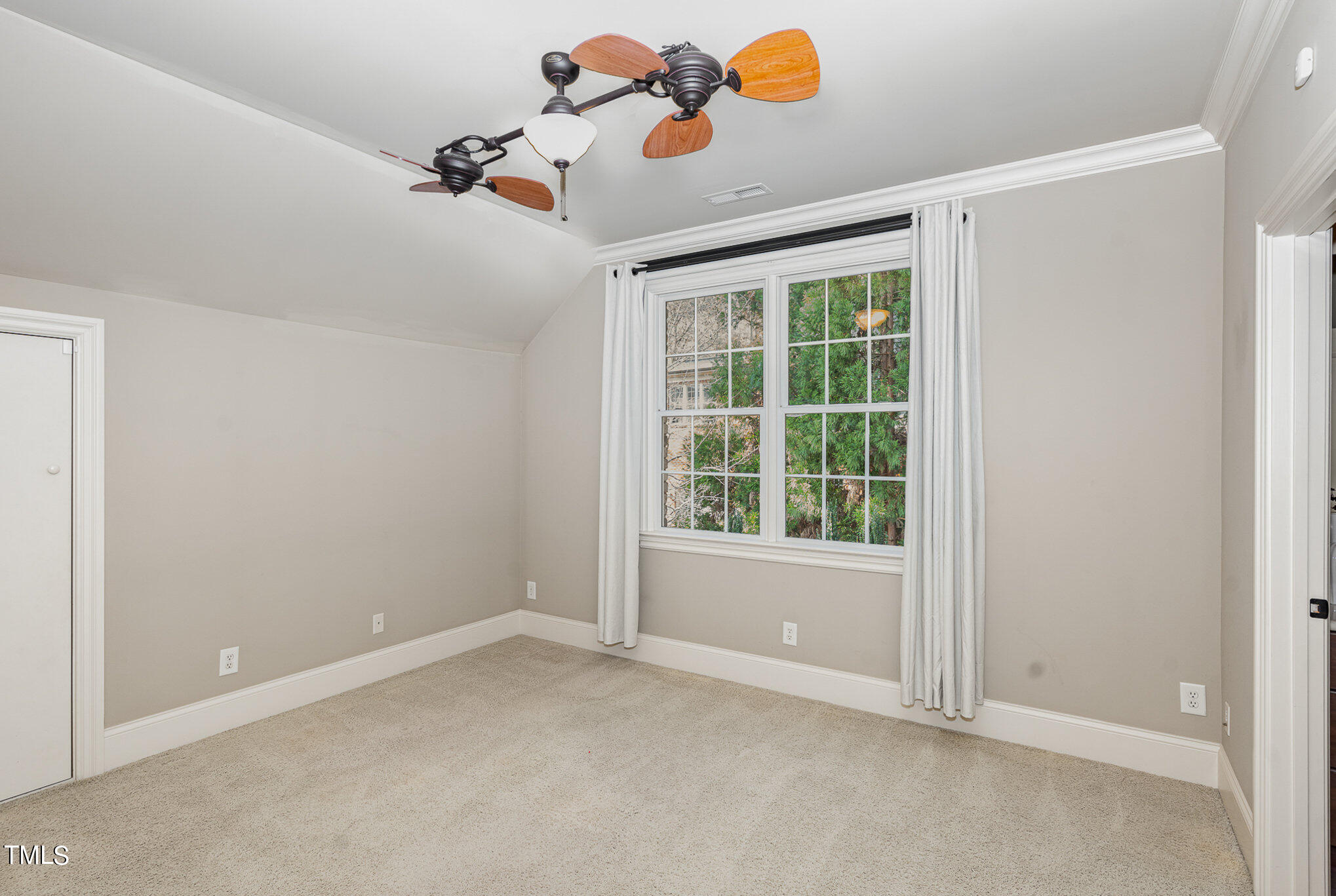3028 Wyntree Ridge Way Raleigh, NC 27606 - Photo 29 of 39 an empty room with a window