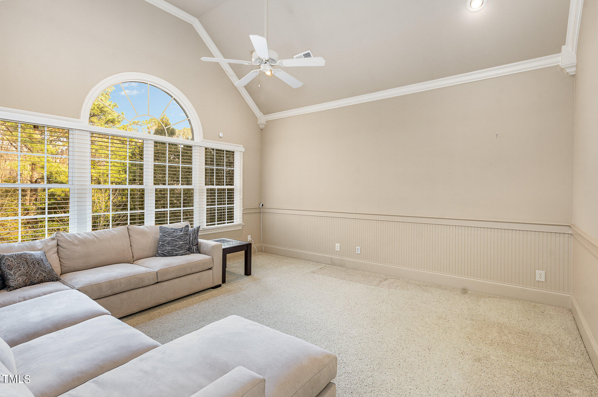 3028 Wyntree Ridge Way Raleigh, NC 27606 - Photo 31 of 39 a living room with furniture and a large window