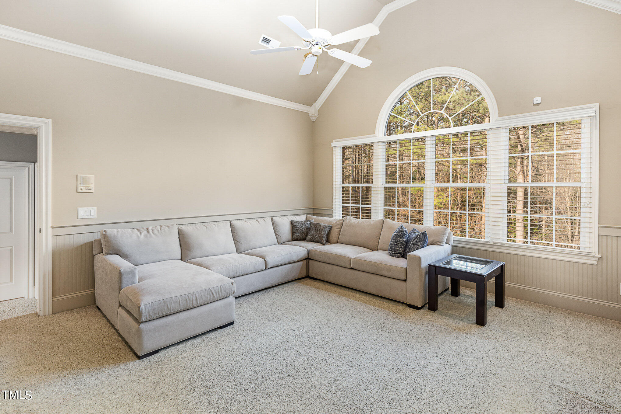 3028 Wyntree Ridge Way Raleigh, NC 27606 - Photo 32 of 39 a living room with furniture and a large window
