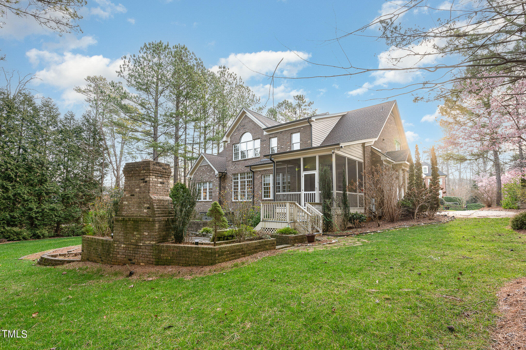 3028 Wyntree Ridge Way Raleigh, NC 27606 - Photo 35 of 39 a view of a building with a yard