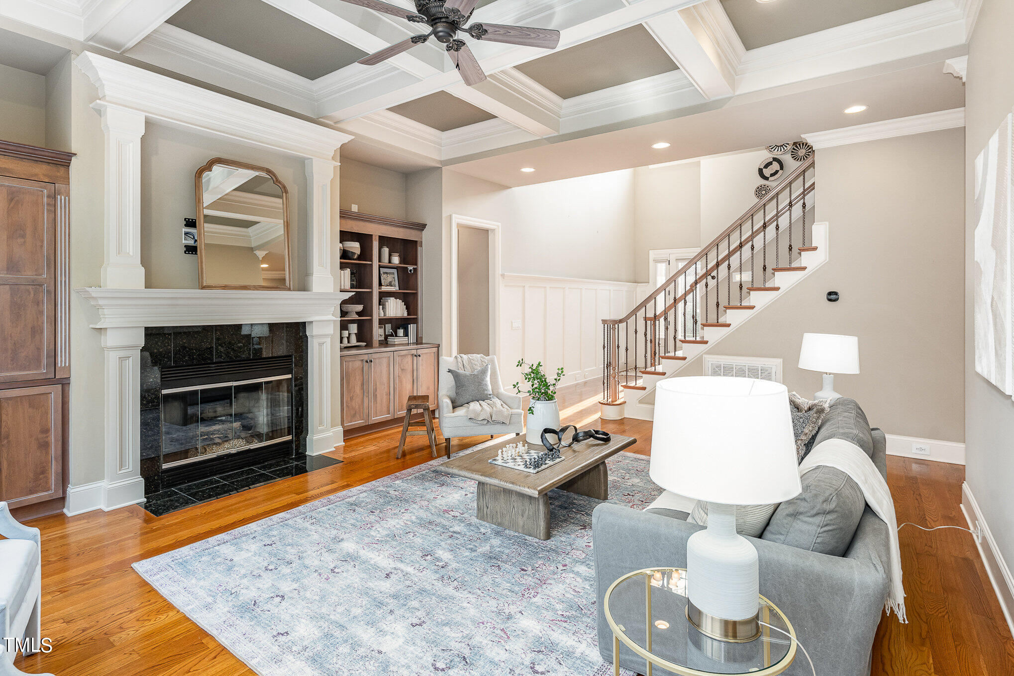 3028 Wyntree Ridge Way Raleigh, NC 27606 - Photo 4 of 39 a living room with furniture and a fireplace