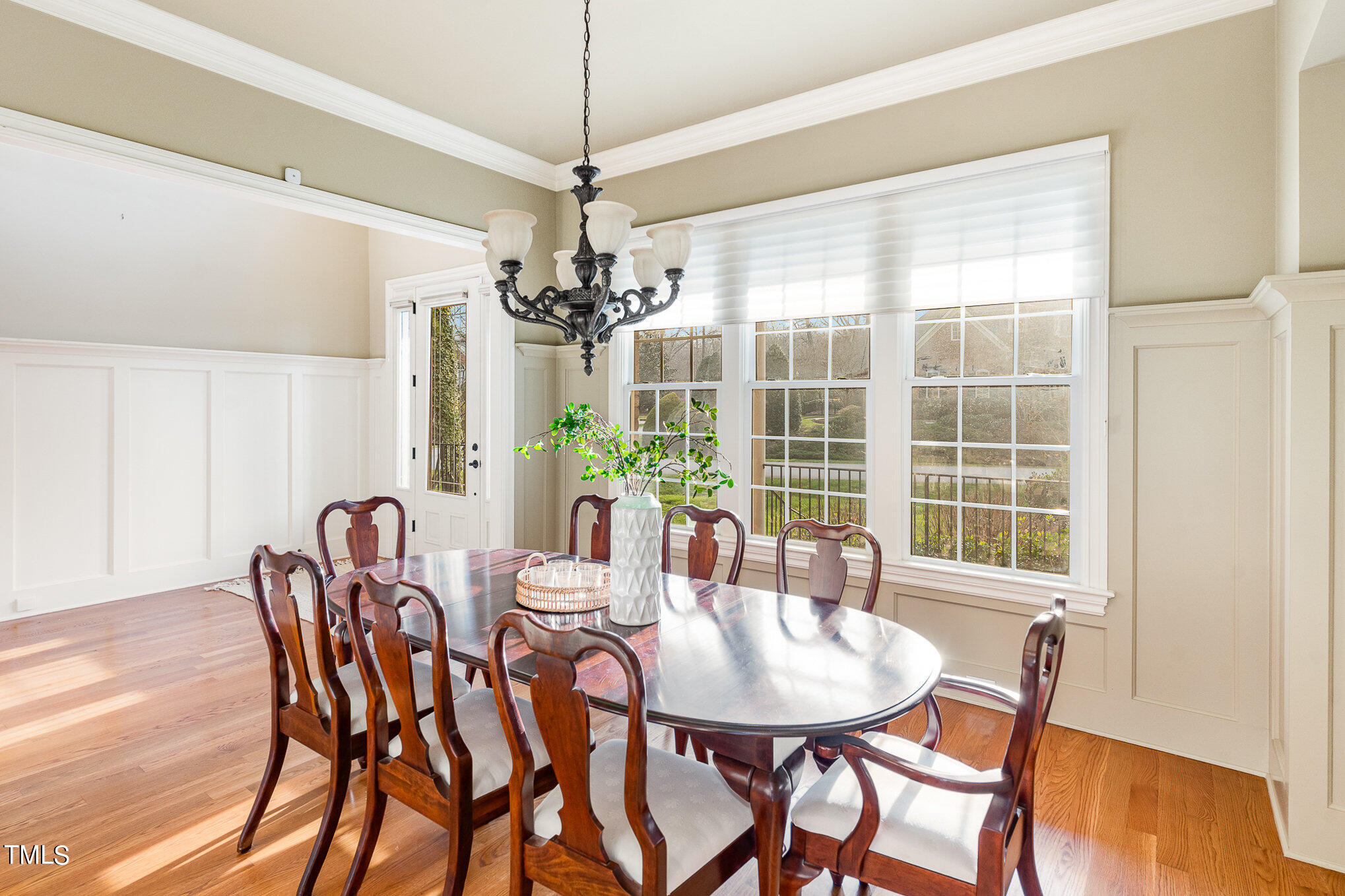 3028 Wyntree Ridge Way Raleigh, NC 27606 - Photo 7 of 39 a view of a dining room with furniture window and wooden floor