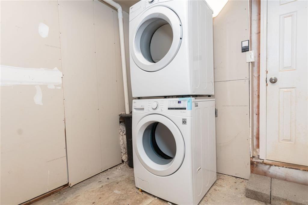 1348 Surrey Lane Southwest Marietta, GA 30008 - Photo 9 of 10 a utility room with dryer and washer