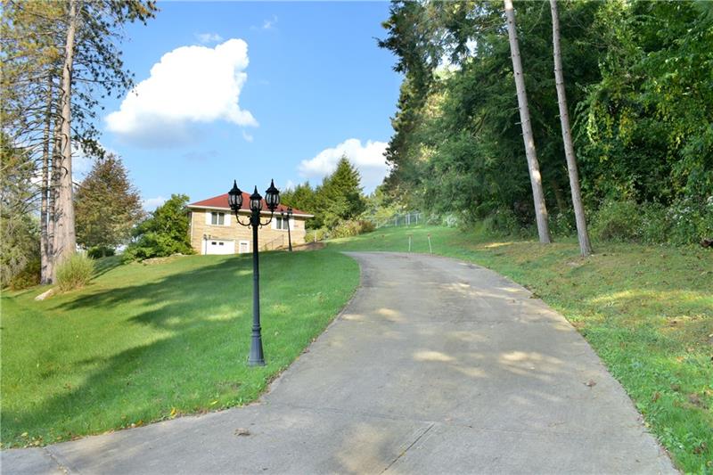 1294 Clifton Road Washington, PA 15301 - Photo 2 of 23 This House has two driveways Oversized one car garage 17x30 Very Private Definitely not a drive by!!