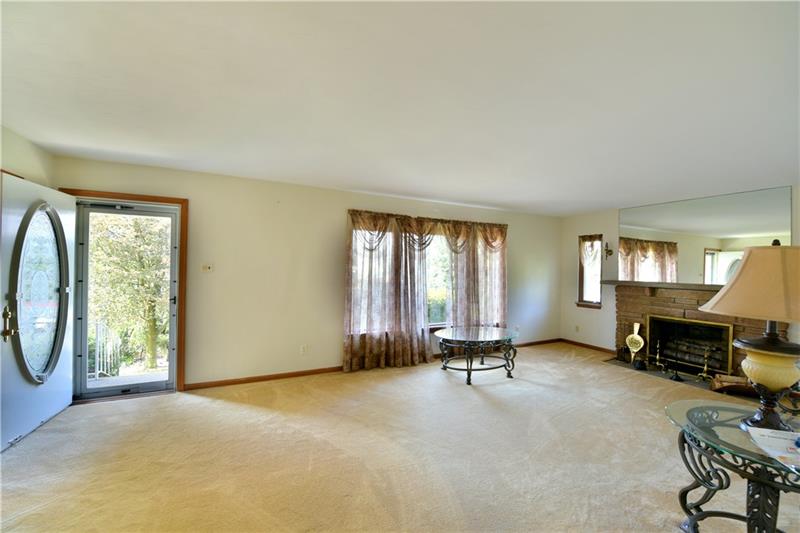 1294 Clifton Road Washington, PA 15301 - Photo 9 of 23 Beautiful Living room 24x13 Stone fireplace! With Awesome views Beautiful front door is very inviting
