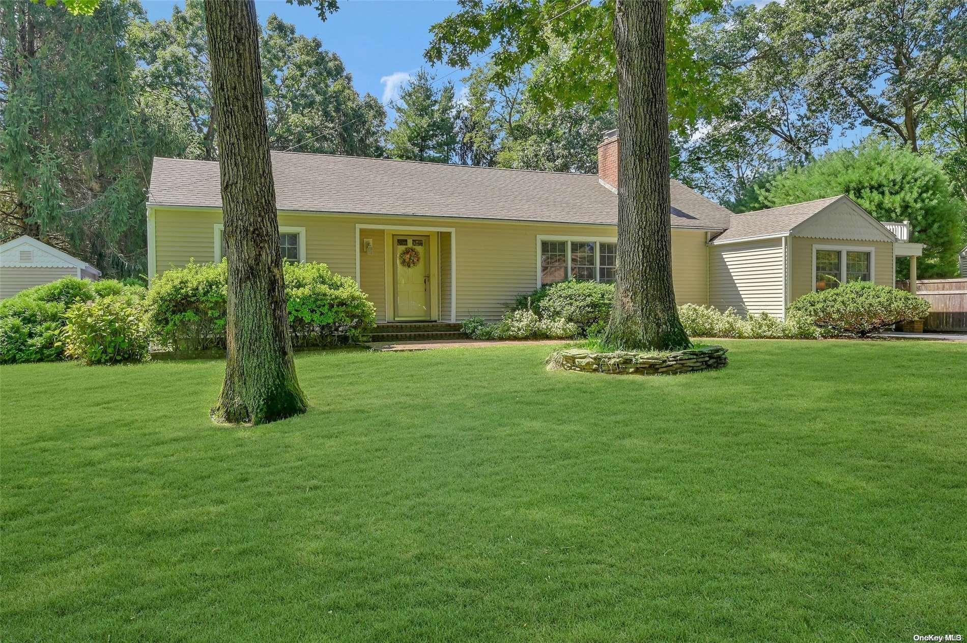 16 Huyler Road Setauket, NY 11733 - Photo 1 of 1 a front view of house with yard and green space