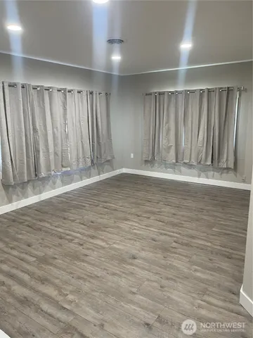 a view of wooden floor and staircase