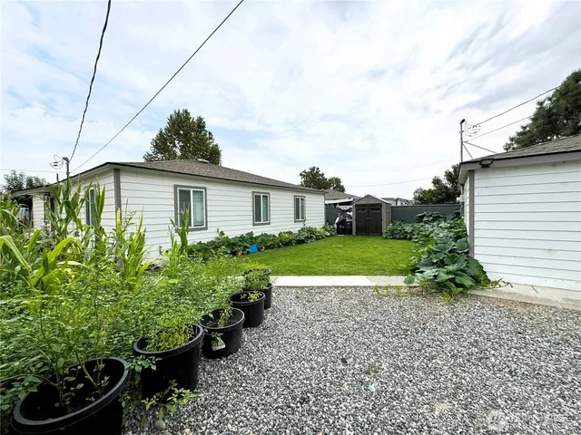 a view of a house with a garden
