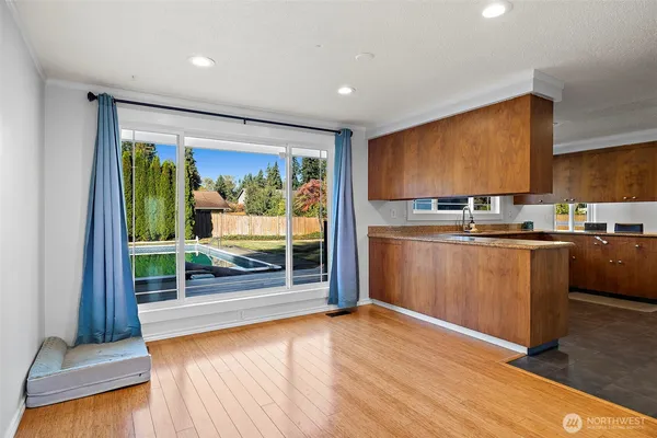 a kitchen with stainless steel appliances a refrigerator and a sink