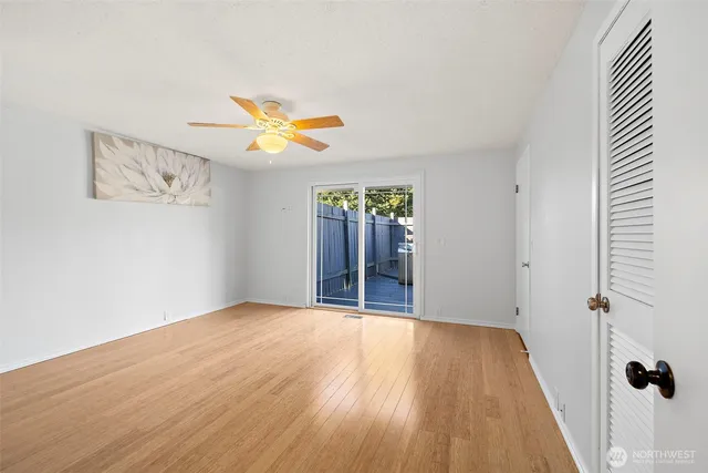 a view of an empty room with a window