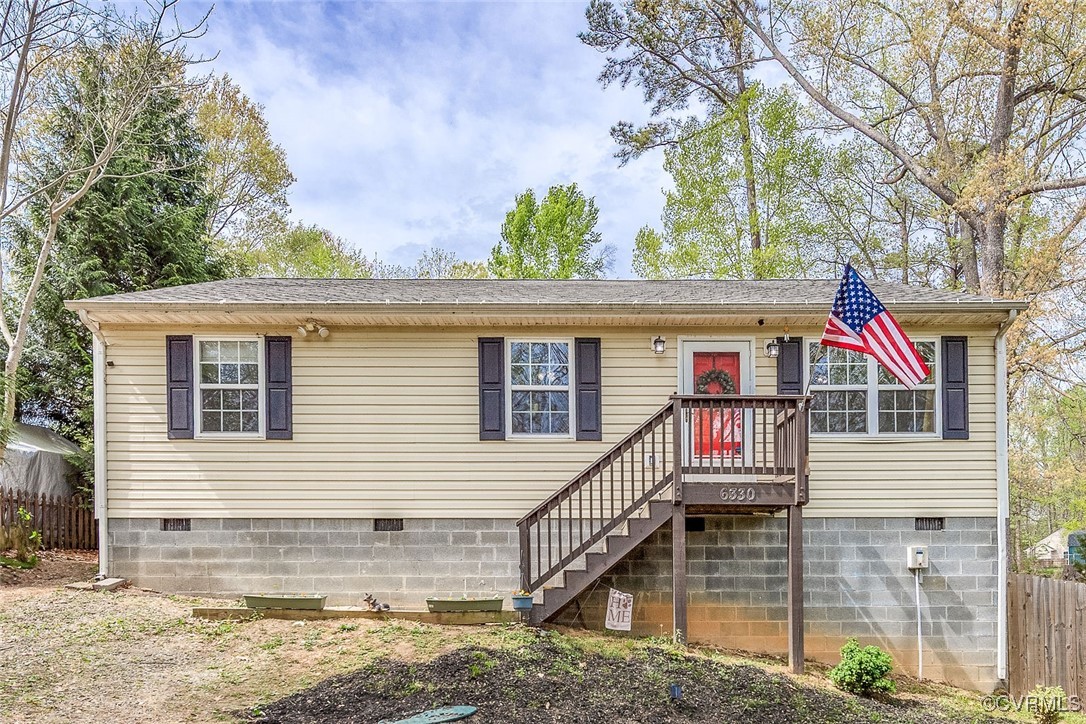 6330 Oak Drive Quinton, VA 23141 - Photo 3 of 23 a view of a house with a small yard and a large tree in the background