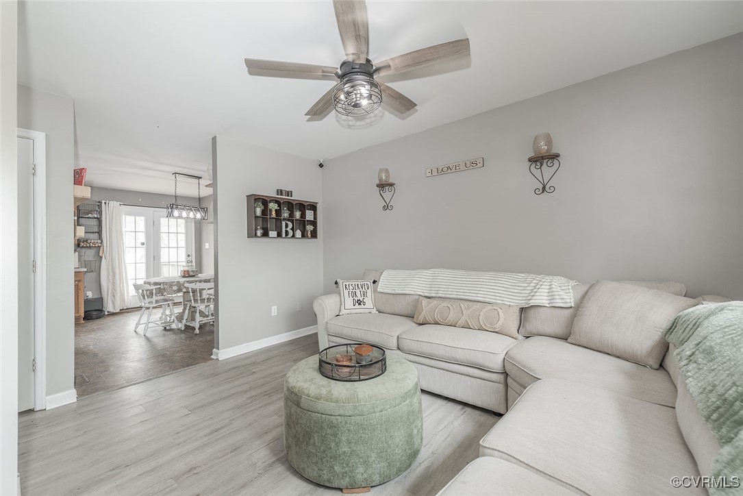 6330 Oak Drive Quinton, VA 23141 - Photo 5 of 23 a living room with furniture and a chandelier