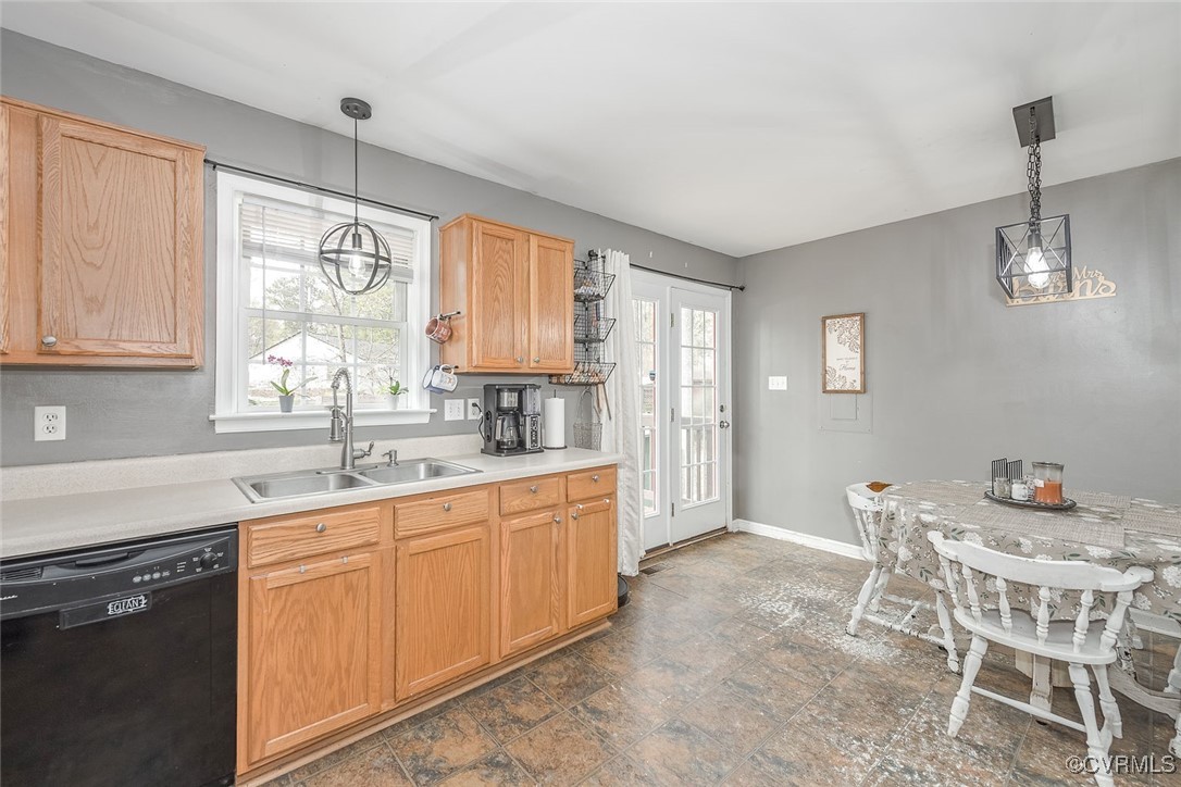 6330 Oak Drive Quinton, VA 23141 - Photo 10 of 23 a kitchen with a sink window and cabinets