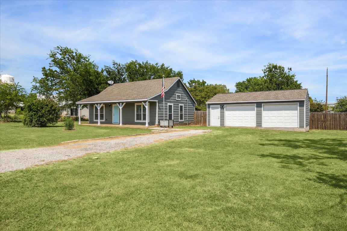 109 Bryson Bend Liberty Hill, TX 78642 - Photo 1 of 1 a front view of a house with a garden