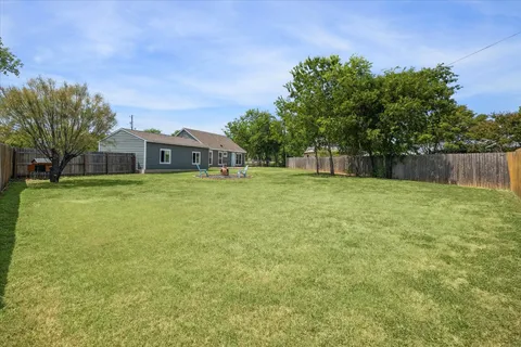 a view of a house with a big yard