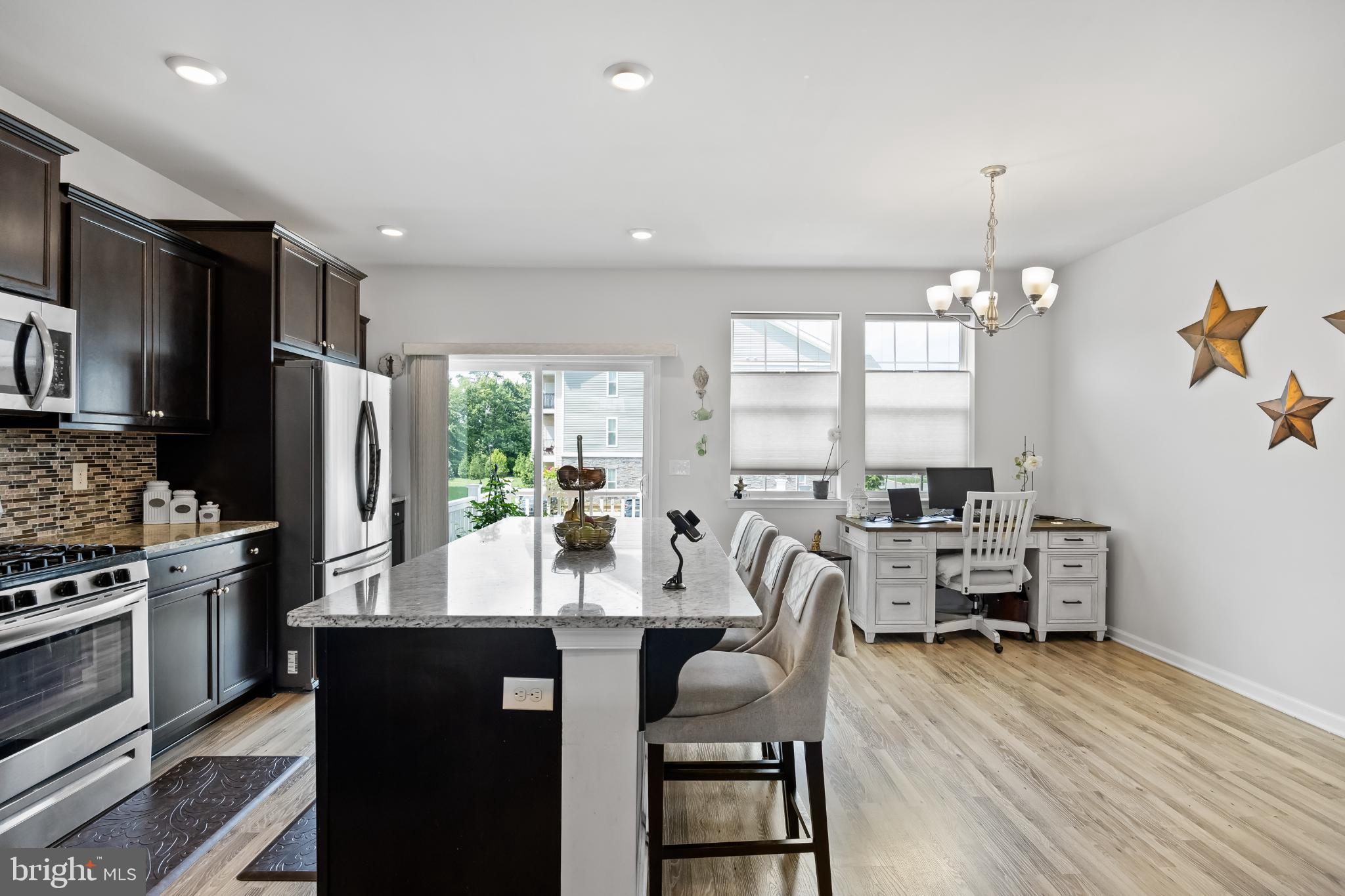 6 Rome Way Mount Laurel, NJ 08054 - Photo 11 of 28 a very nice looking kitchen with a large window a dining table and chairs