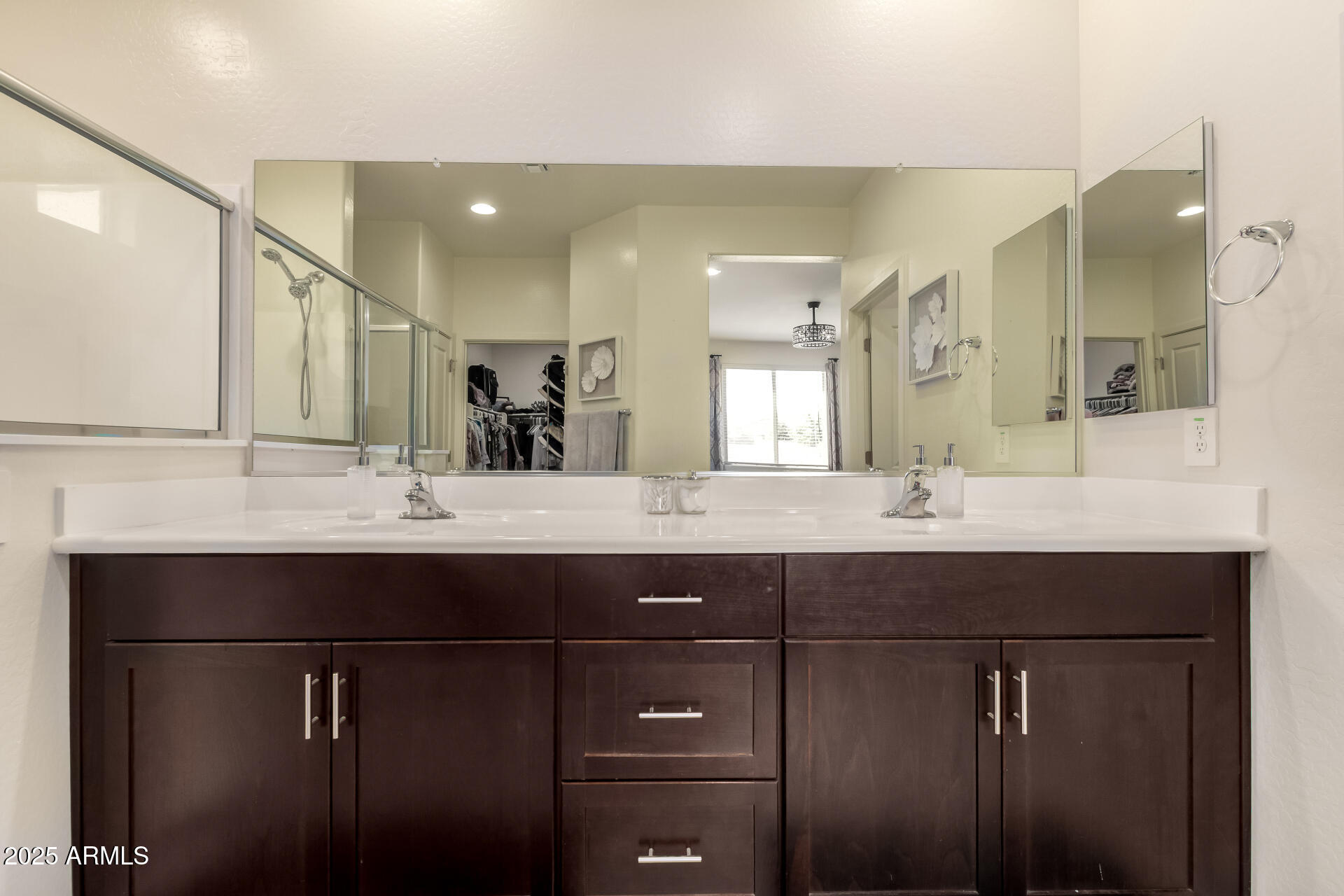 20485 North Candlelight Road Maricopa, AZ 85138 - Photo 16 of 26 a bathroom with a sink and a mirror