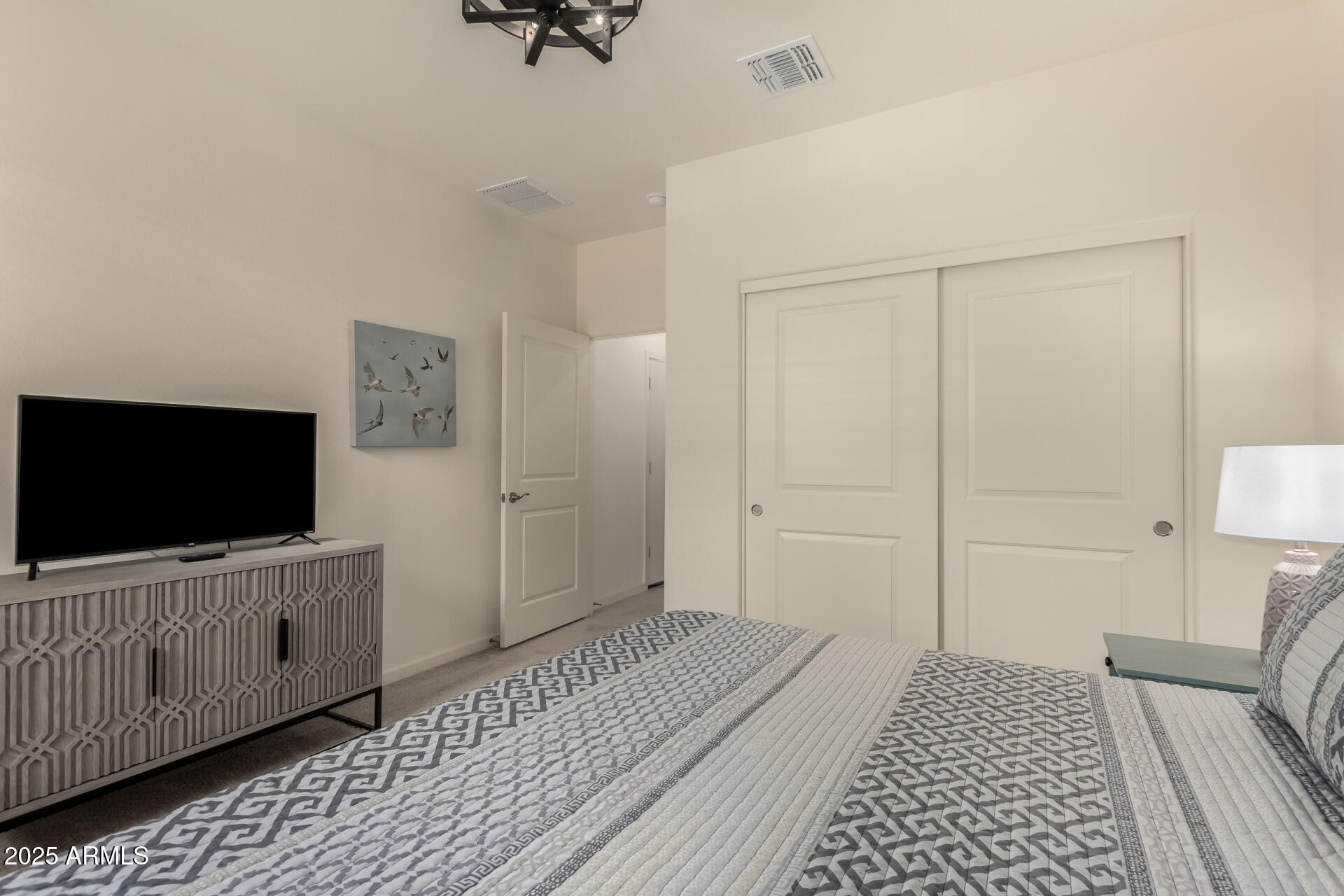 20485 North Candlelight Road Maricopa, AZ 85138 - Photo 19 of 26 a view of a room with a flat screen tv