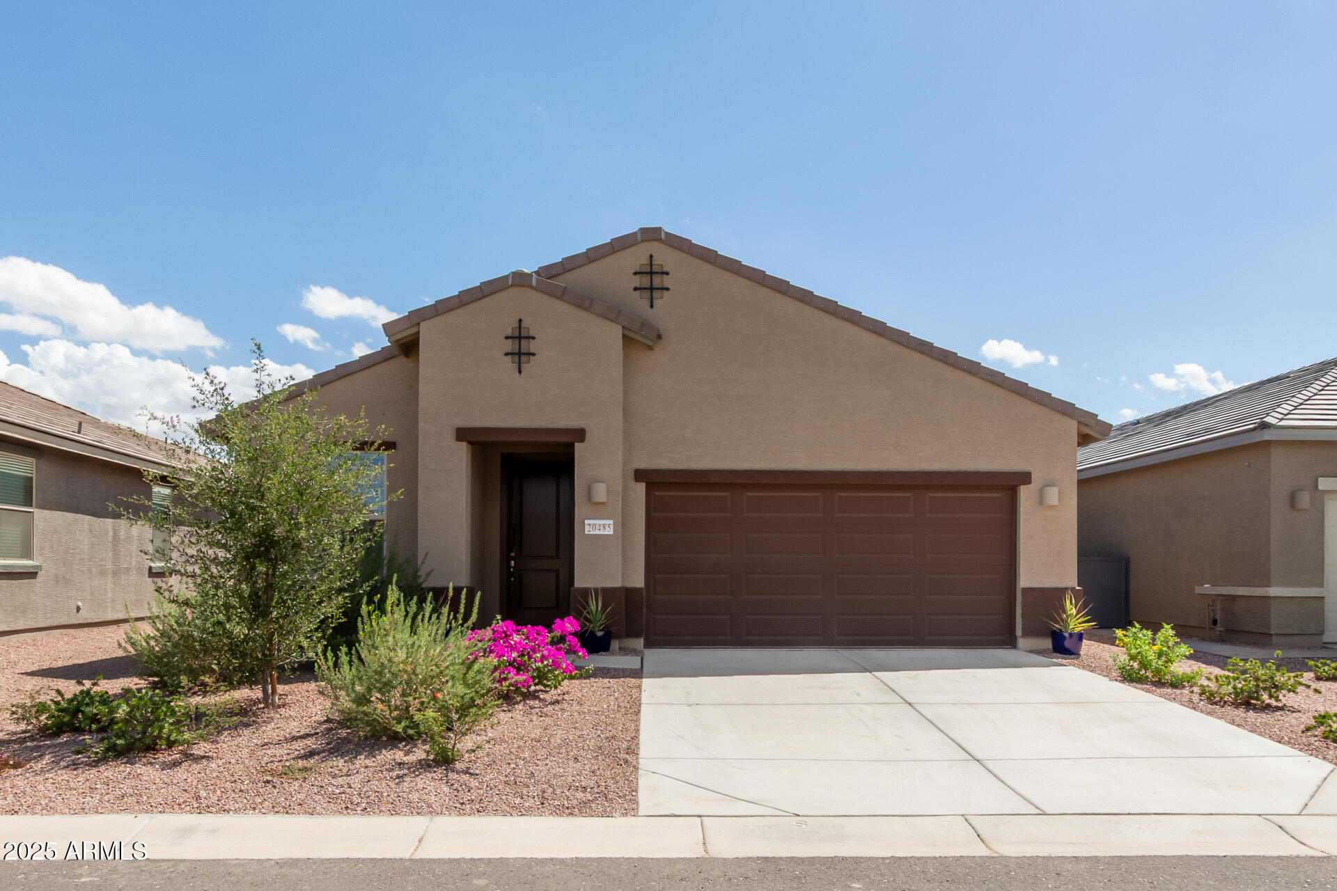 20485 North Candlelight Road Maricopa, AZ 85138 - Photo 2 of 26 a front view of a house