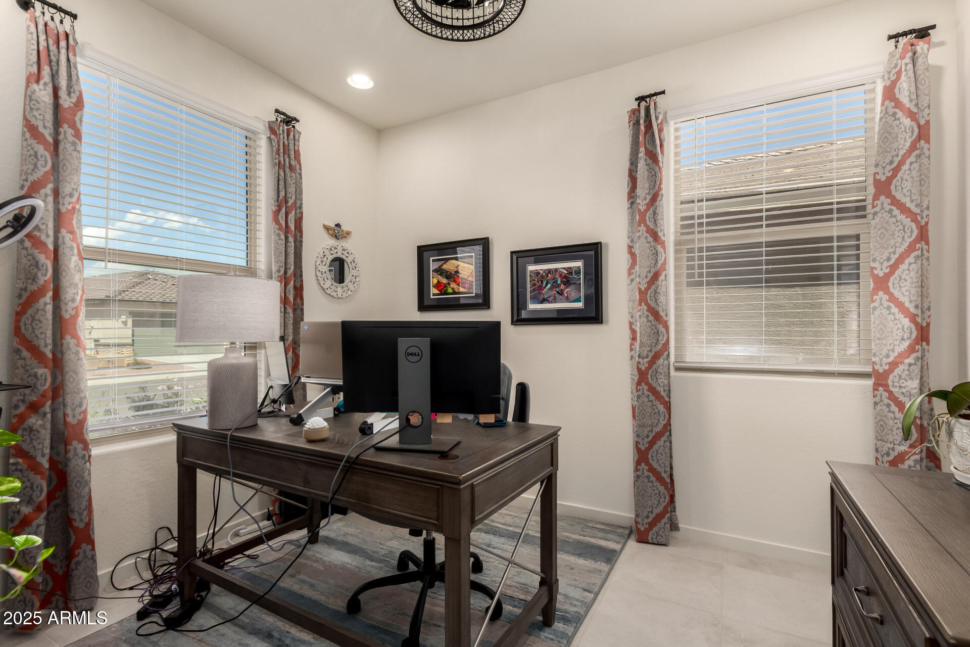 20485 North Candlelight Road Maricopa, AZ 85138 - Photo 21 of 26 a view of a workspace with furniture and a window