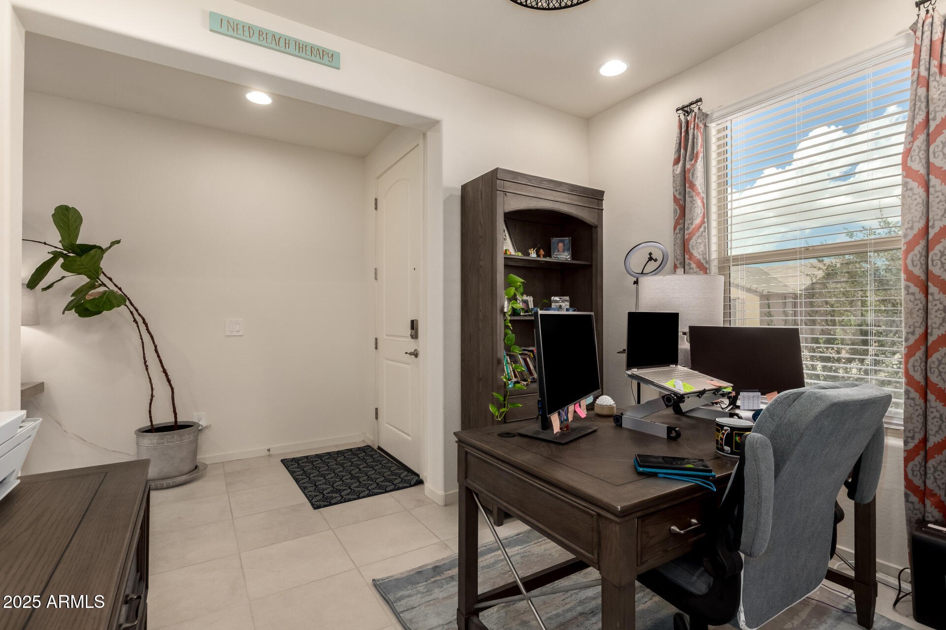 20485 North Candlelight Road Maricopa, AZ 85138 - Photo 22 of 26 a view of a workspace with furniture