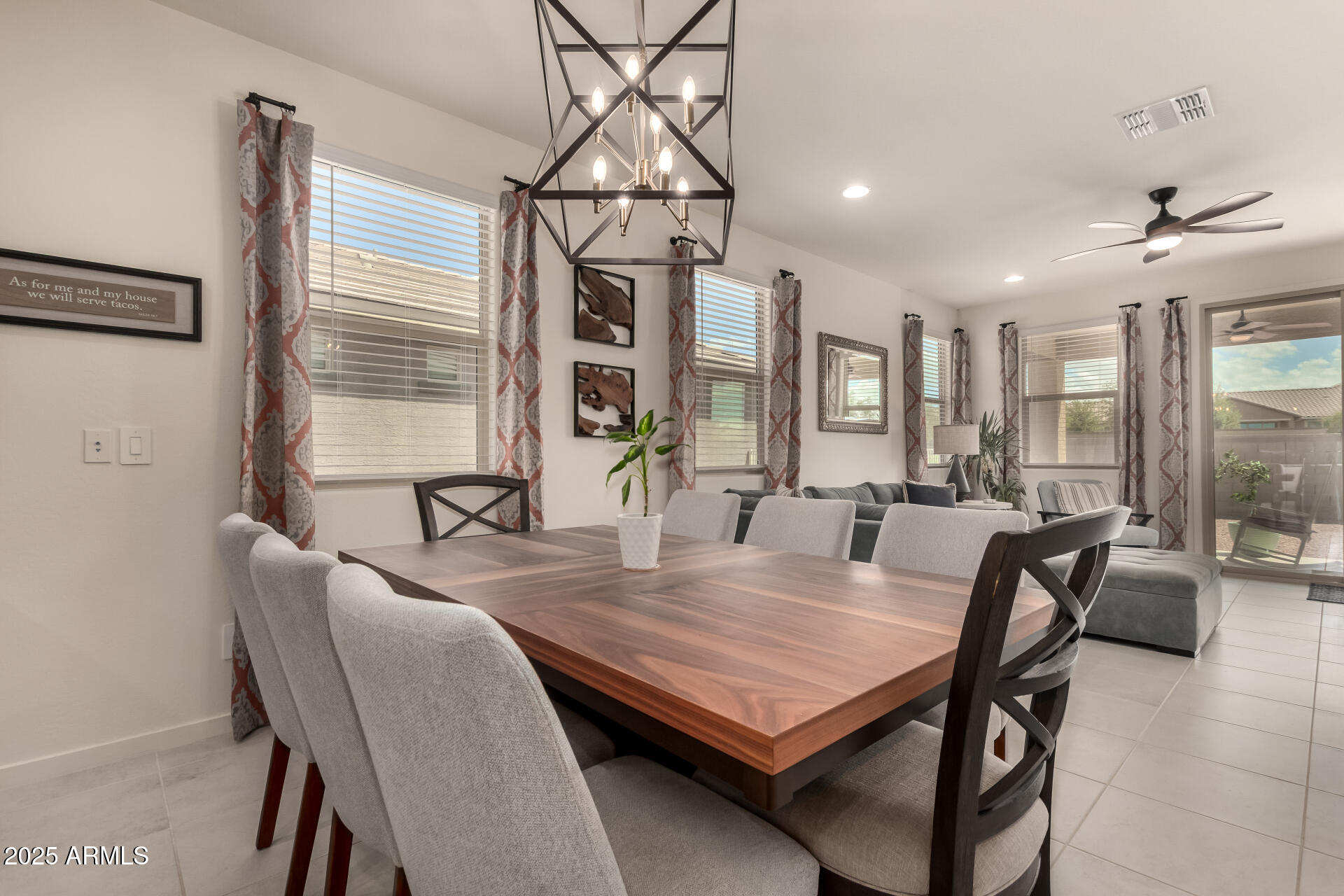 20485 North Candlelight Road Maricopa, AZ 85138 - Photo 8 of 26 a dining room with furniture and window