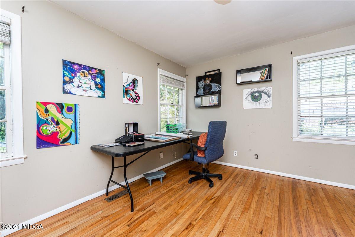 7798 Zebulon Road Macon, GA 31220 - Photo 13 of 35 a view of a workspace with a window