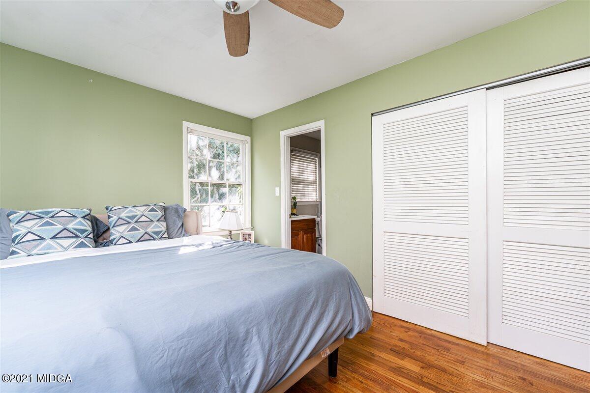 7798 Zebulon Road Macon, GA 31220 - Photo 21 of 35 a bedroom with a large bed and a window