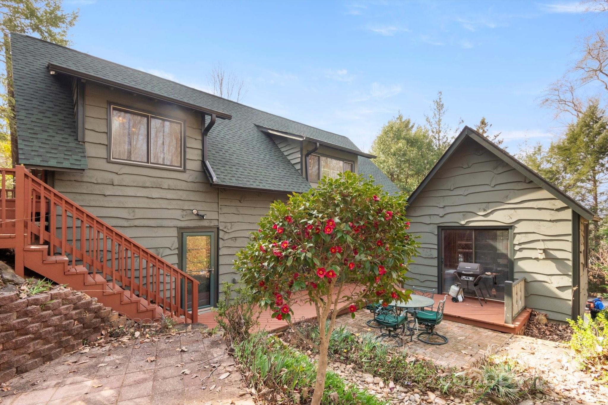1506 Lynn Road Columbus, NC 28722 - Photo 2 of 30 a view of a house with patio outdoor seating area