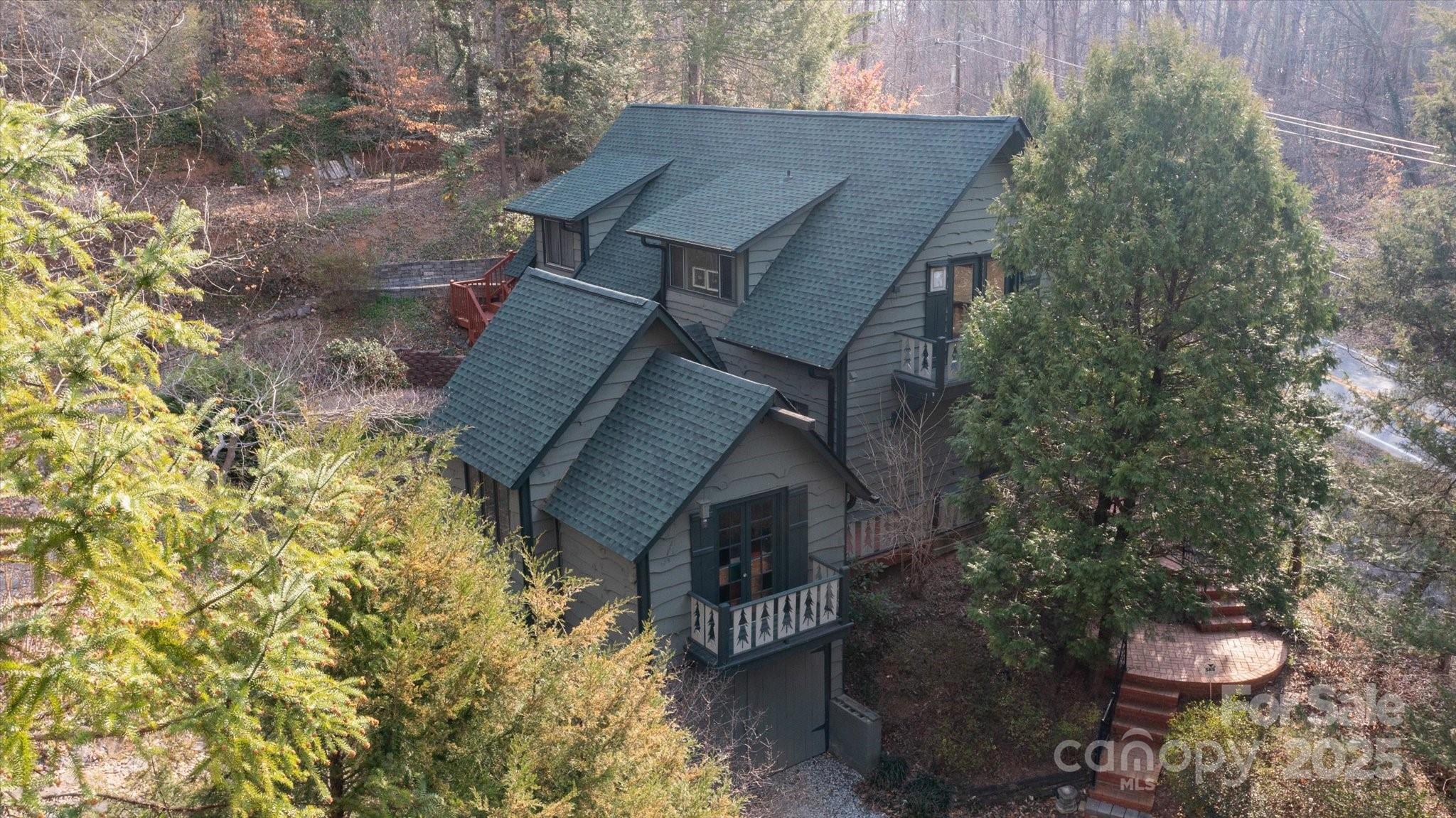 1506 Lynn Road Columbus, NC 28722 - Photo 23 of 30 front view of a house with a yard