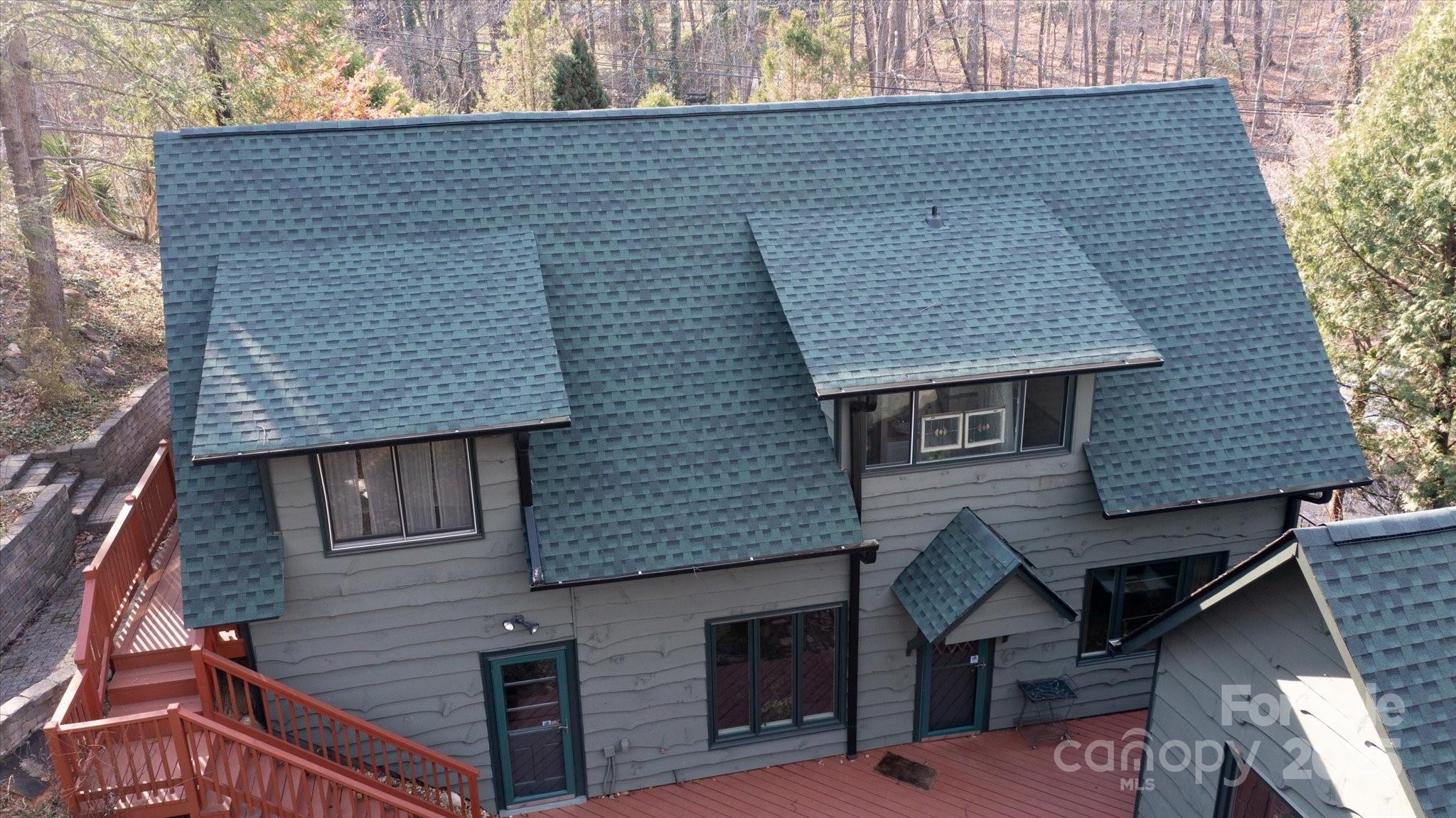 1506 Lynn Road Columbus, NC 28722 - Photo 24 of 30 a front view of a house with a balcony