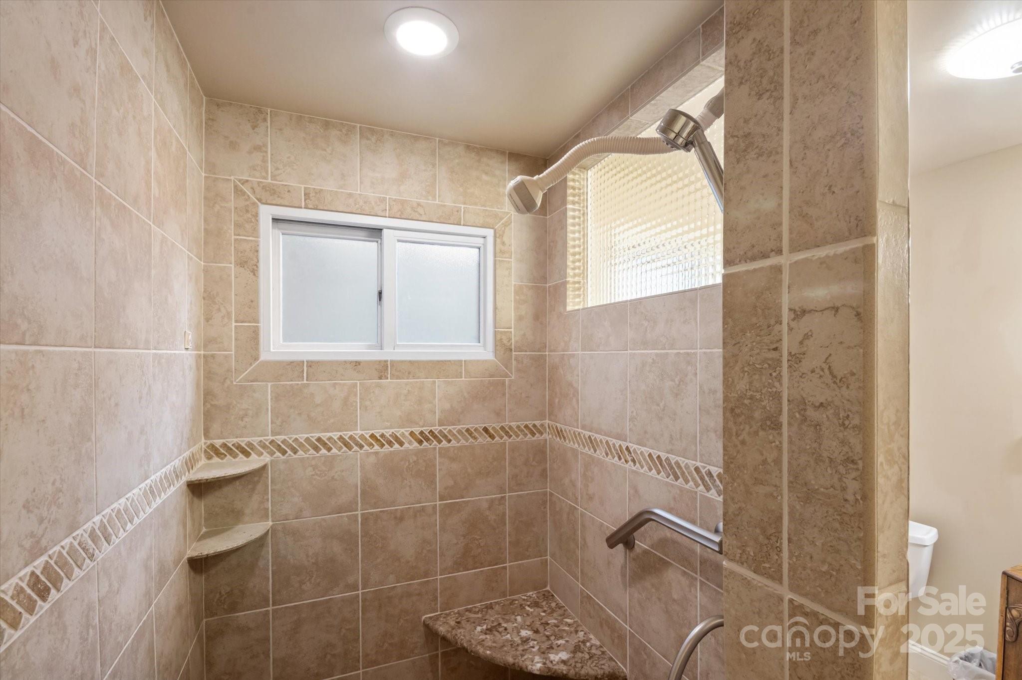 1506 Lynn Road Columbus, NC 28722 - Photo 9 of 30 a bathroom with a shower