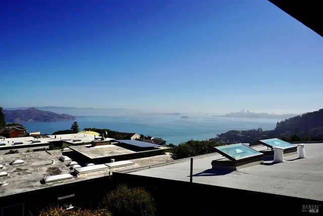 a view of a terrace with sitting area