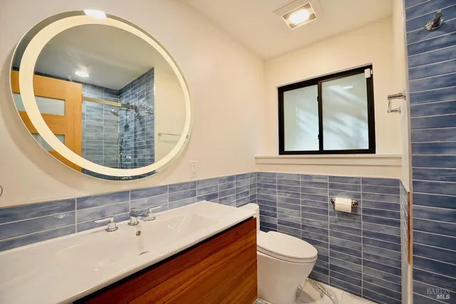 a bathroom with a sink and a toilet