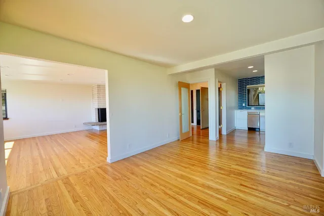 a view of balcony with wooden floor