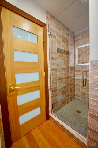 a living room with a washer and dryer