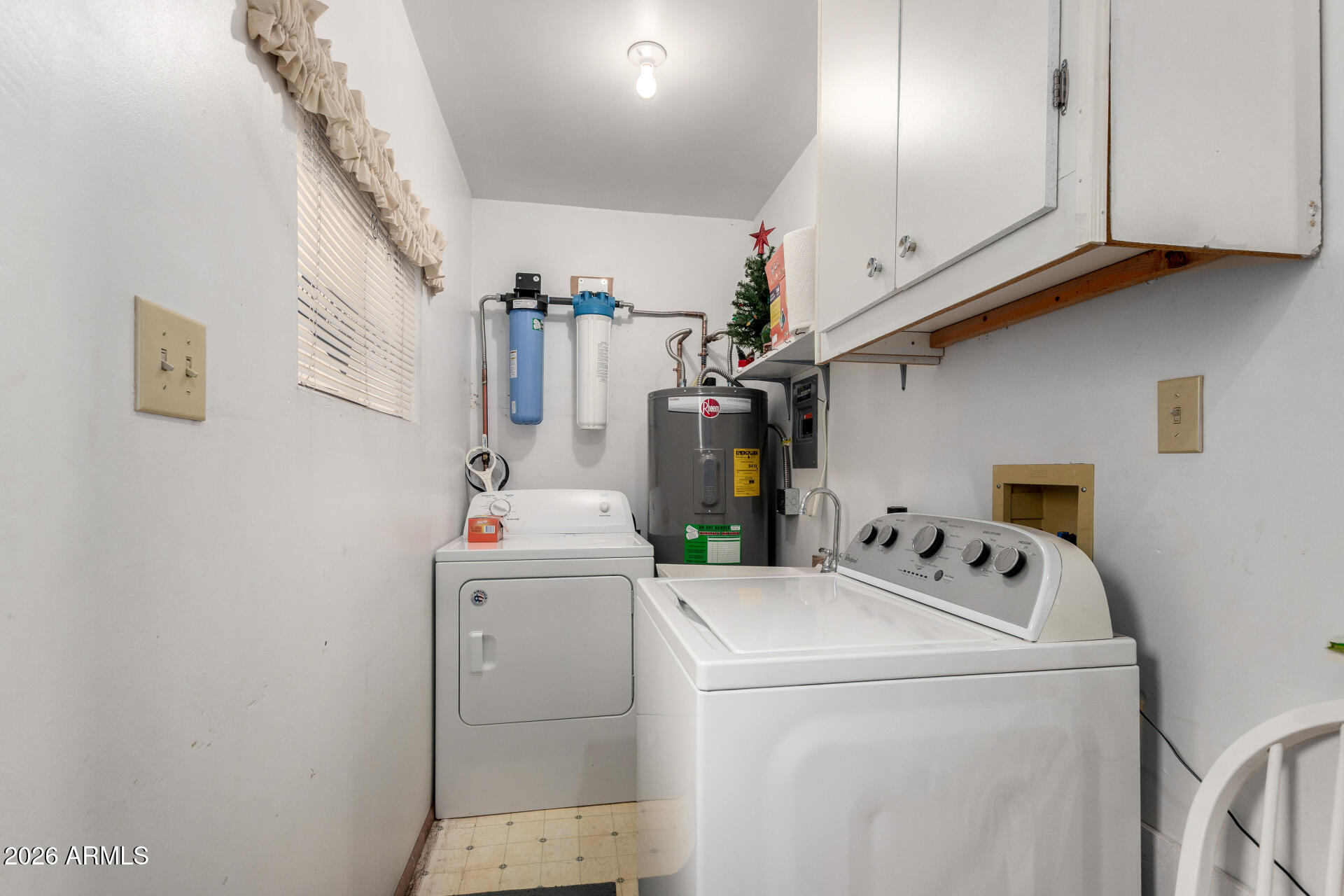 7750 East Broadway Road, Unit 533 Mesa, AZ 85208 - Photo 20 of 21 a utility room with dryer and washer