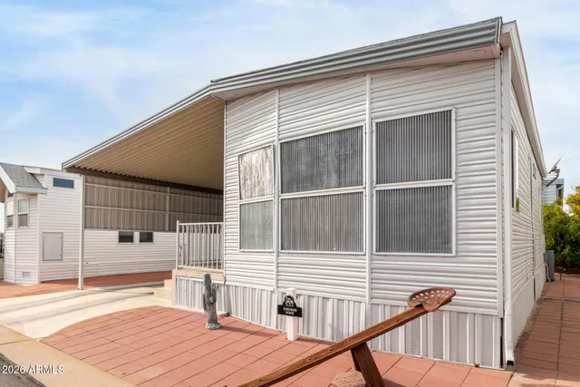 a balcony view with a outdoor seating space