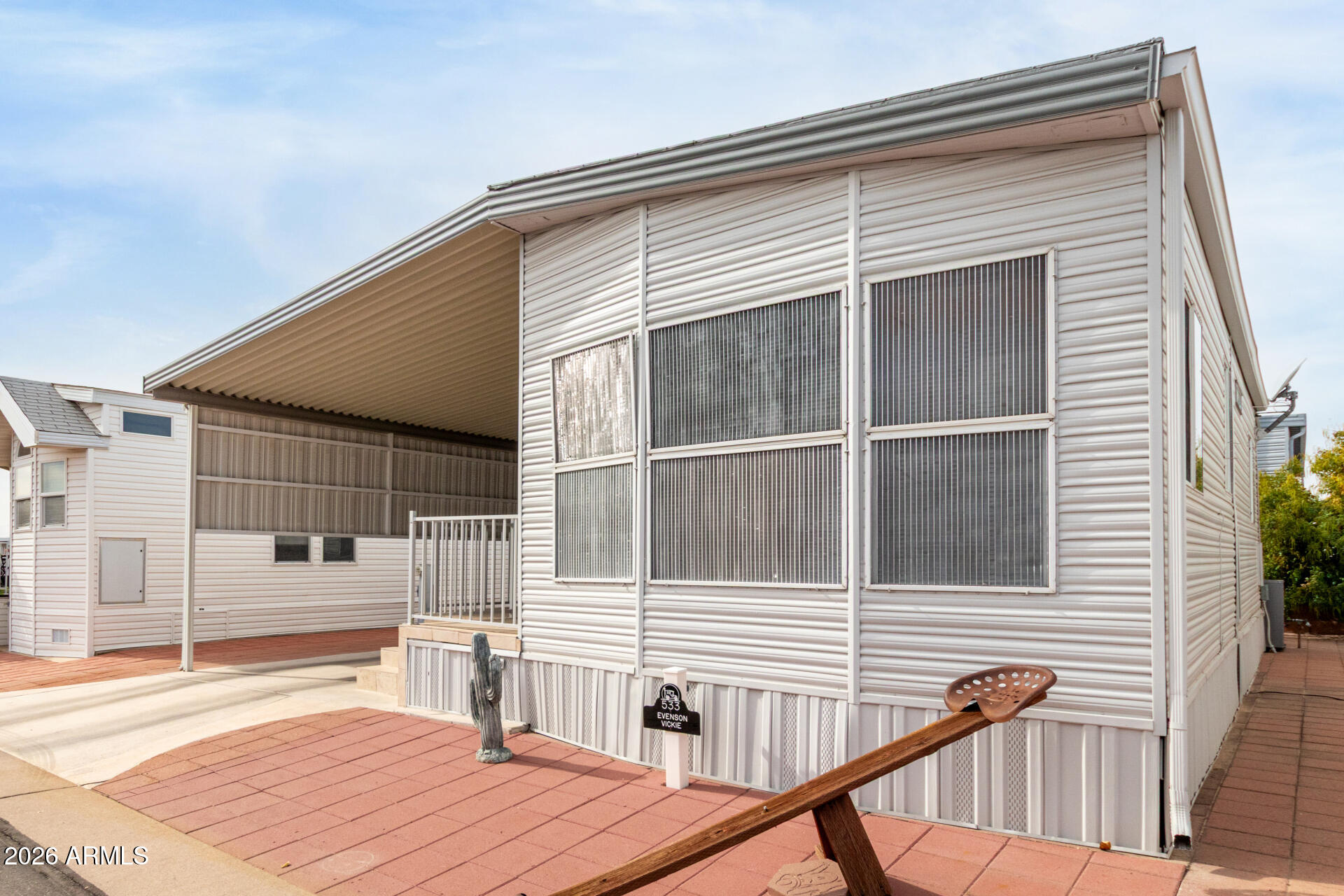 7750 East Broadway Road, Unit 533 Mesa, AZ 85208 - Photo 4 of 21 a balcony view with a outdoor seating space