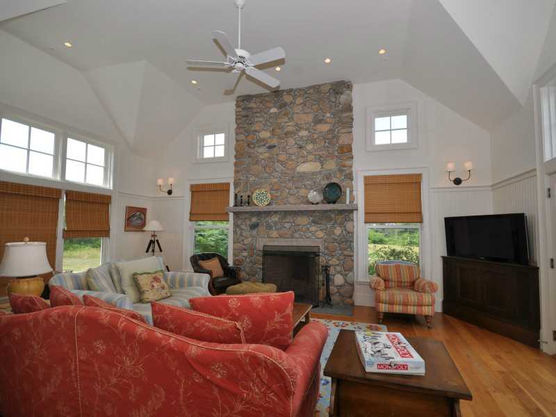 1351 Cooneymus Road Block Island, RI 02807 - Photo 9 of 25 Exterior Front. Massive stone fireplace focal point
