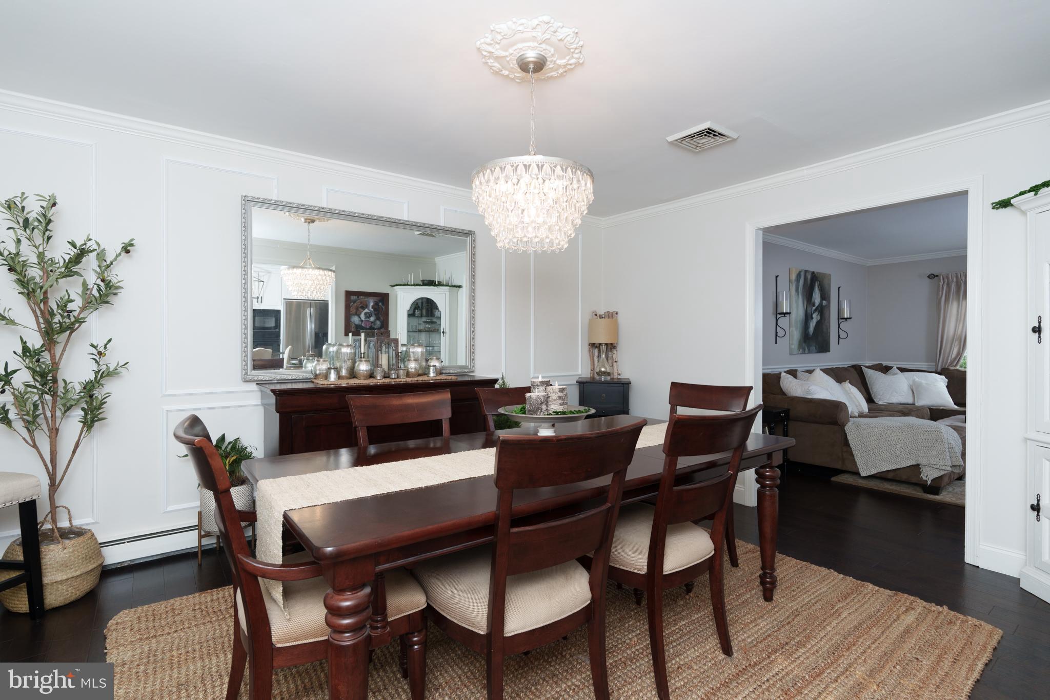 1411 Greenhill Road West Chester, PA 19380 - Photo 12 of 40 a view of a dining room with furniture and wooden floor
