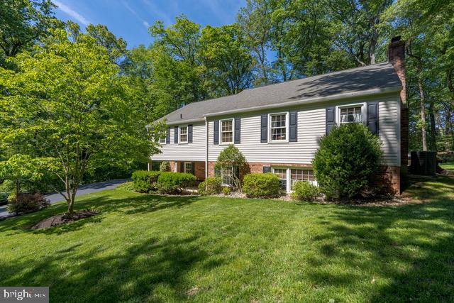 1411 Greenhill Road West Chester, PA 19380 - Photo 2 of 40 a front view of a house with a yard