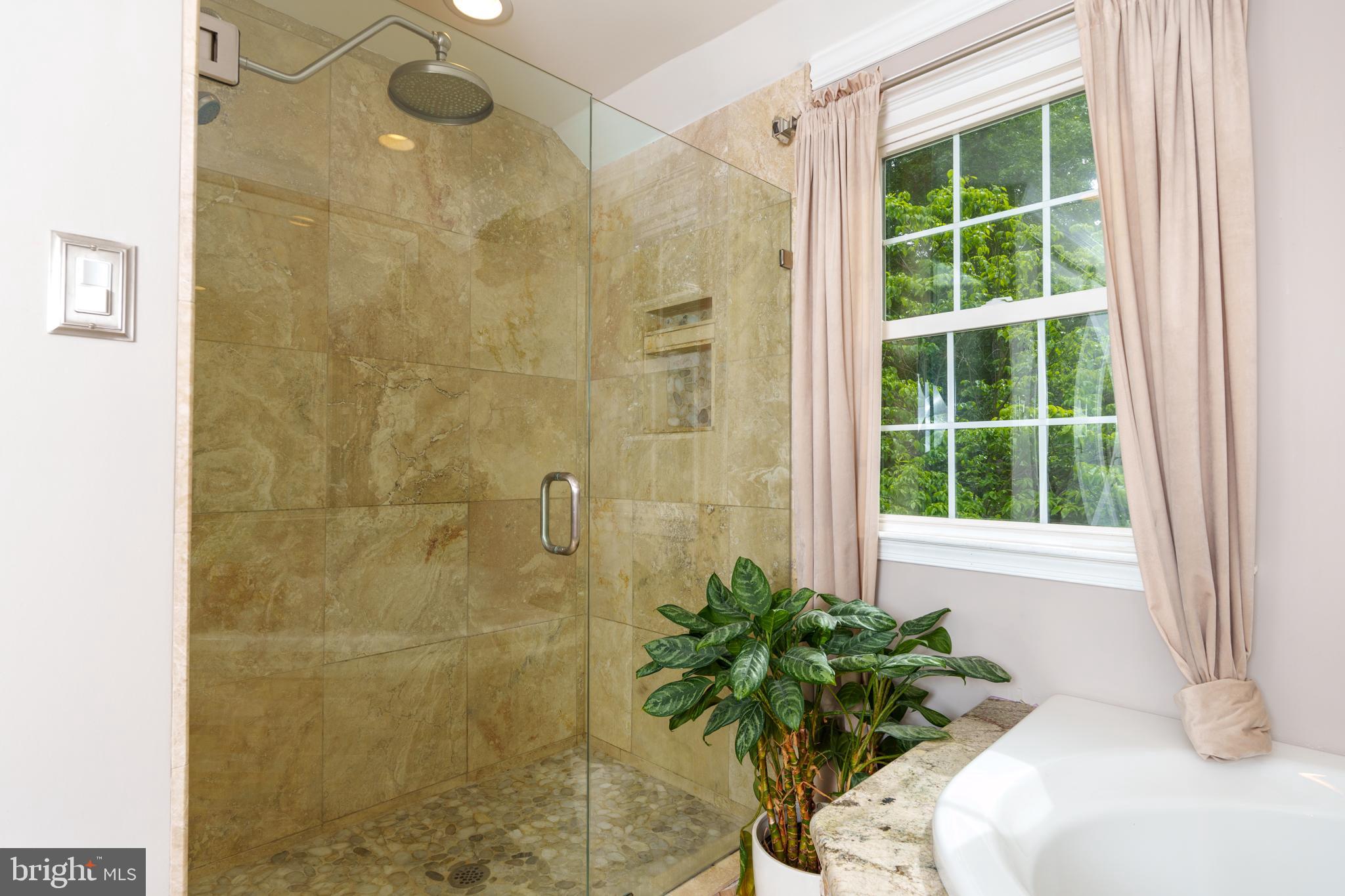 1411 Greenhill Road West Chester, PA 19380 - Photo 22 of 40 a white bath tub sitting next to a window